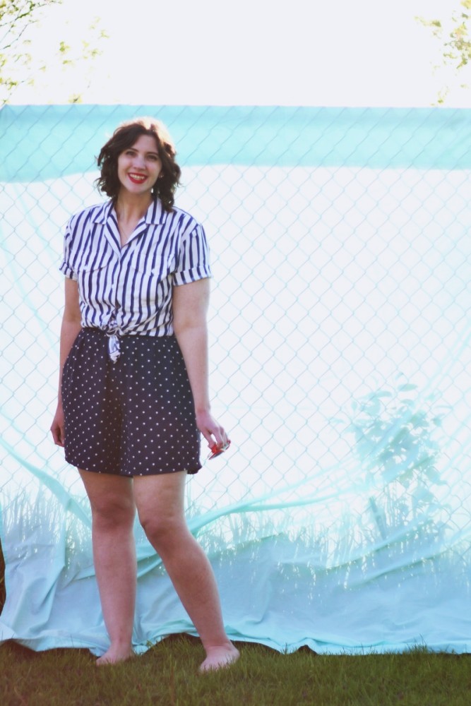 Outfit mixing striped shirt and polka dotted shorts. Sunny outdoor photos with a bed sheet!
