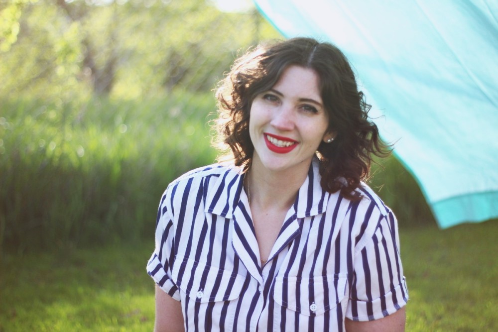 Outfit mixing striped shirt and polka dotted shorts. Sunny outdoor photos with a bed sheet!