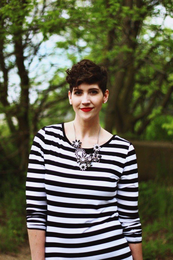 hannah rupp the outfit repeater striped dress red lipstick power women feminist pixie haircut