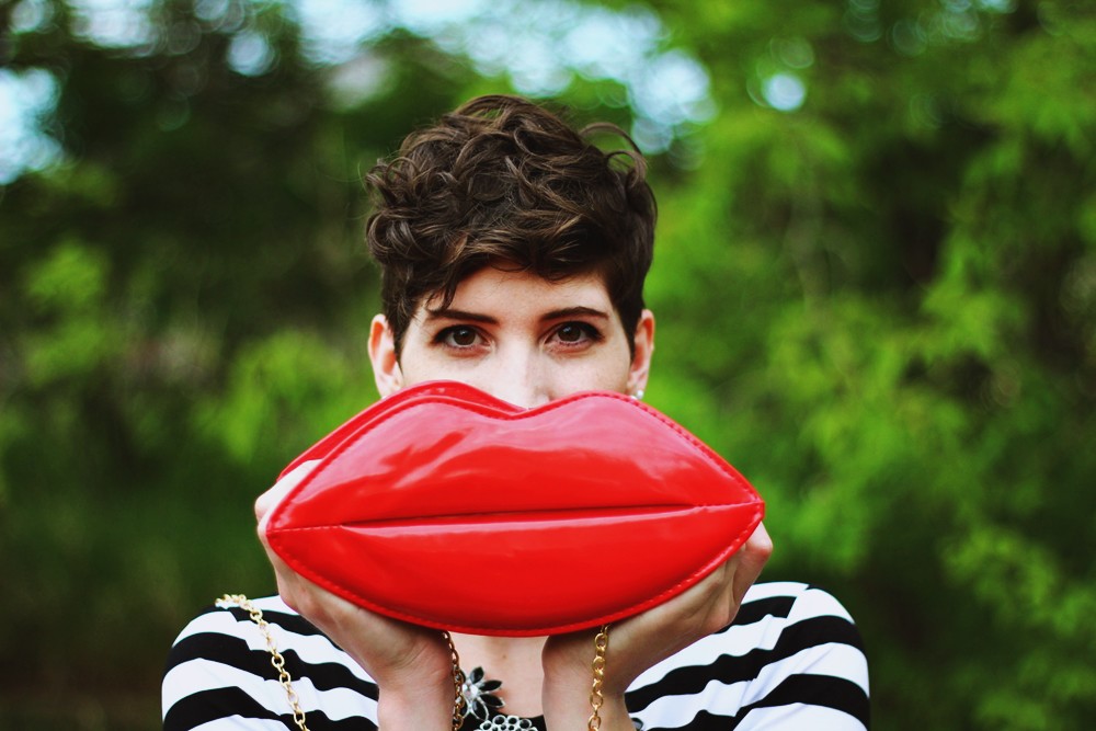 hannah rupp the outfit repeater striped dress red lipstick power women feminist pixie haircut