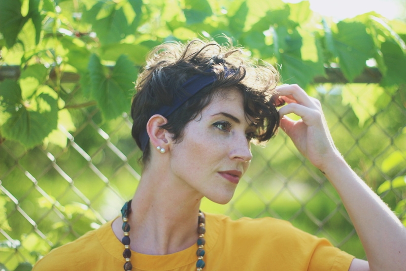 the outfit repeater hannah rupp yellow blouse multi-color skirt thrifted quilted purse beaded necklace