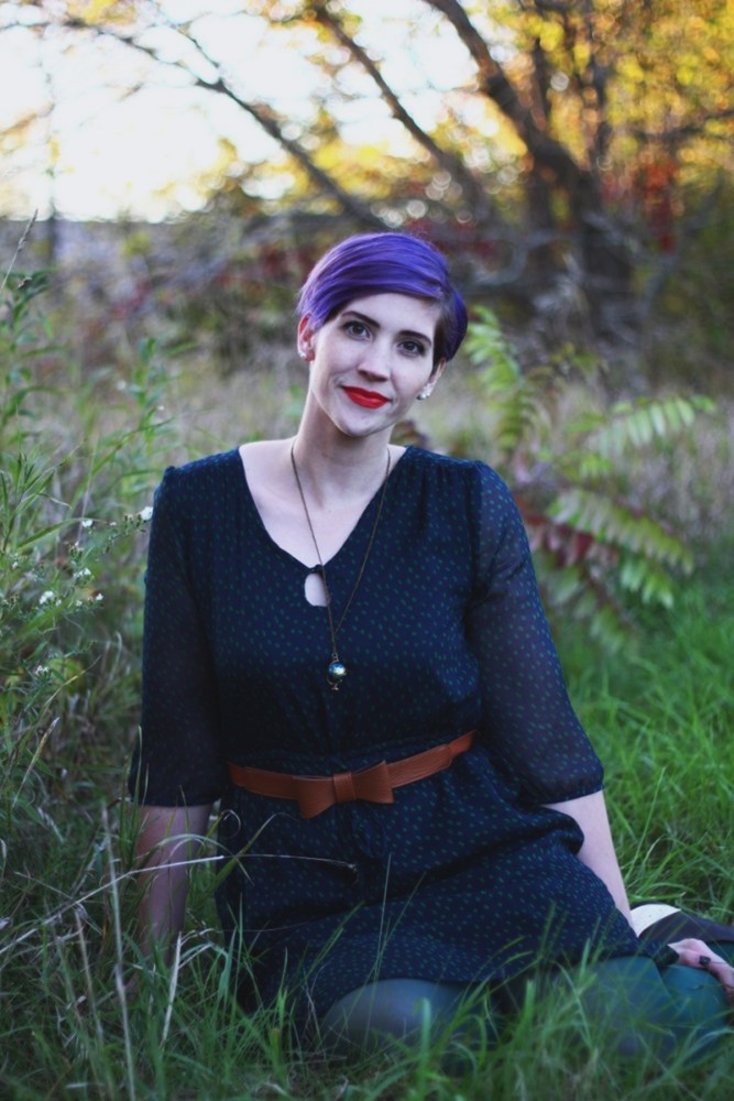 Wearing ALL The Fall Colors! | The Outfit Repeater Outfit: Navy blue dress, forest green tights, cognac bow belt, red lipstick, purple pixie cut