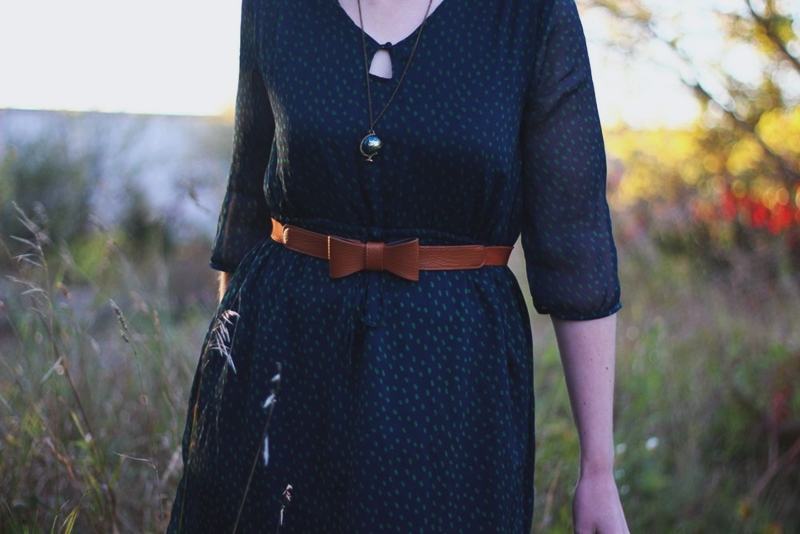Wearing ALL The Fall Colors! | The Outfit Repeater Outfit: Navy blue dress, forest green tights, cognac bow belt, red lipstick, purple pixie cut
