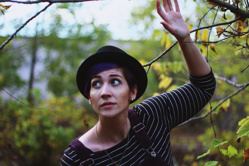 Outfit: Black & white breton striped top, purple corduroy dress, black pork pie hat, purple pixie cut