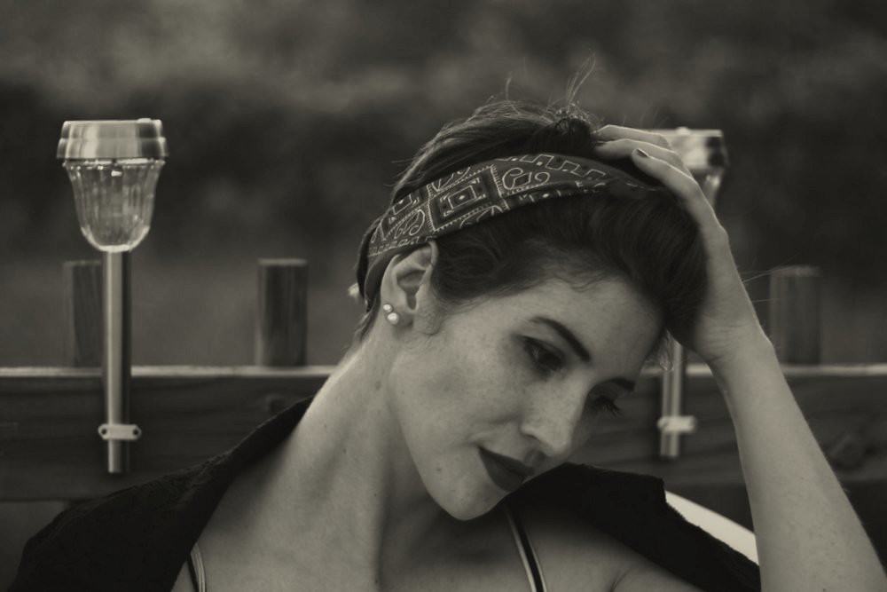 Outfit: Striped retro style dress, black moto jacket, red kitten heels, vintage red belt, red bandana, purple pixie cut