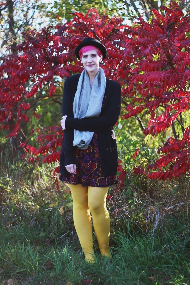 Outfit: autumn leaf print purple dress, yellow gold WeLoveColors tights, long black Wal-Mart cardigan, houndstooth infinity scarf, black ASOS pork pie hat, bright pink pixie cut