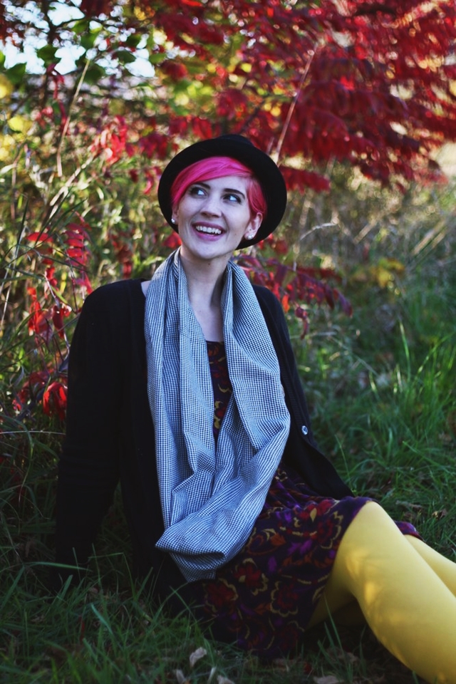 Outfit: autumn leaf print purple dress, yellow gold WeLoveColors tights, long black Wal-Mart cardigan, houndstooth infinity scarf, black ASOS pork pie hat, bright pink pixie cut