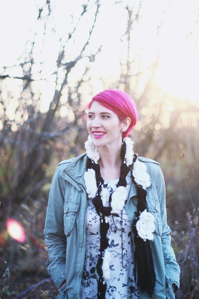 outfit: black and white floral dress, olive colored jacket, black tights, black fake doc martens, flower scarf, magenta pixie cut