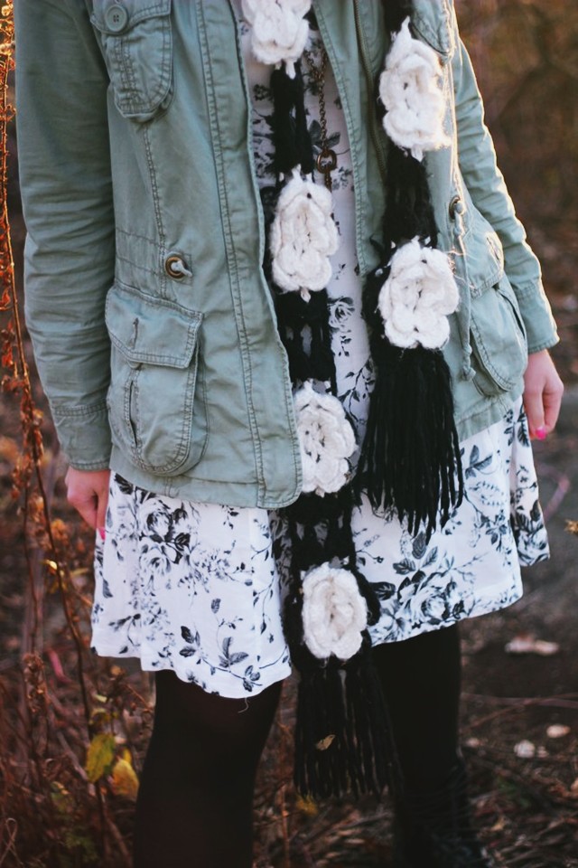 outfit: black and white floral dress, olive colored jacket, black tights, black fake doc martens, flower scarf, magenta pixie cut