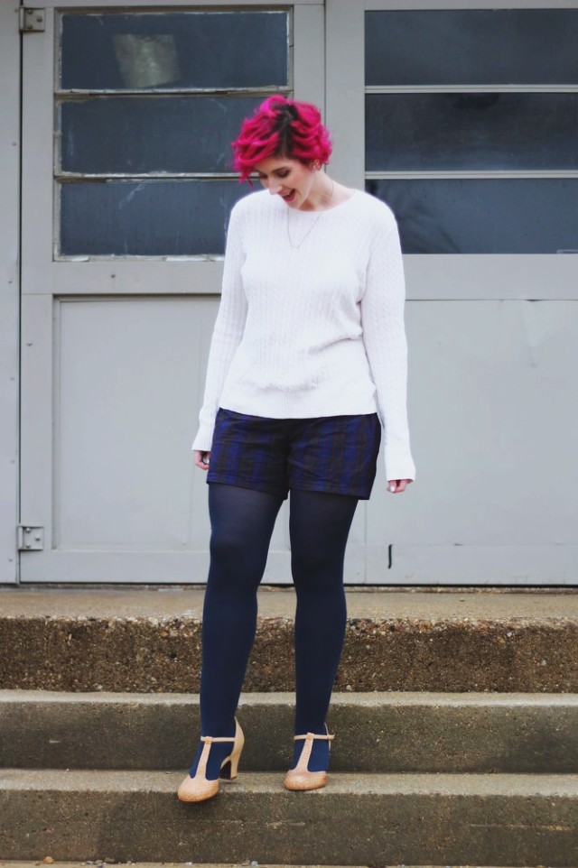 Outfit: furry blue coat, oversized white sweater, high waisted plaid shorts, navy blue tights, beige t-strap high heels, curly pink hair