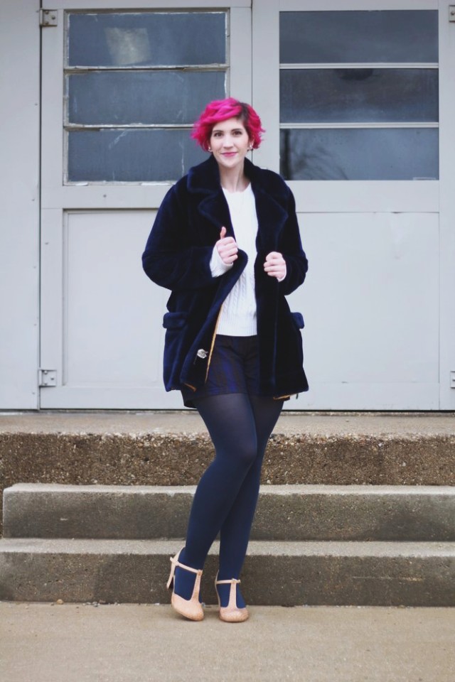 Outfit: furry blue coat, oversized white sweater, high waisted plaid shorts, navy blue tights, beige t-strap high heels, curly pink hair