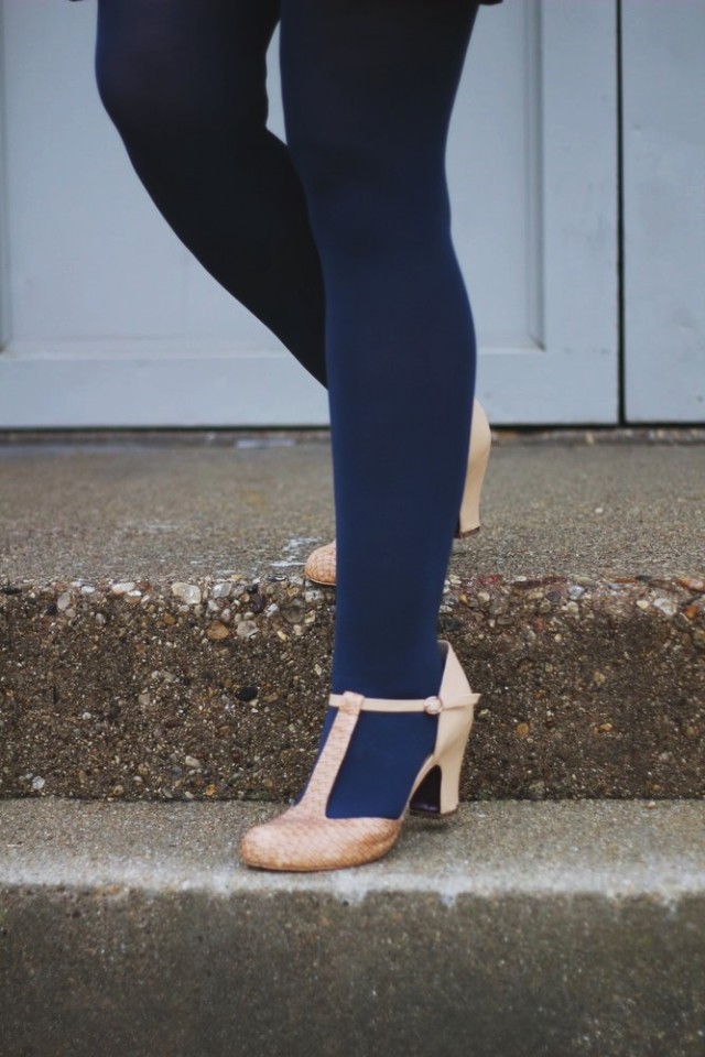 Outfit details: navy blue tights and beige t-strap high heels