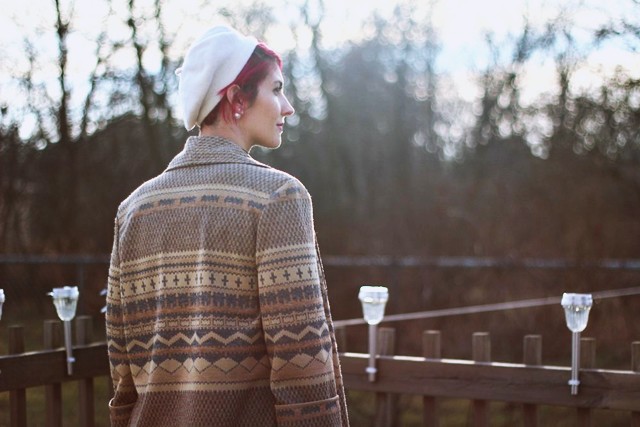 outfit: black high neck early 2000's dress, black tights, camel tan heeled booties, vintage patterned cardigan, bright magenta short hair, white vintage beret thrifted