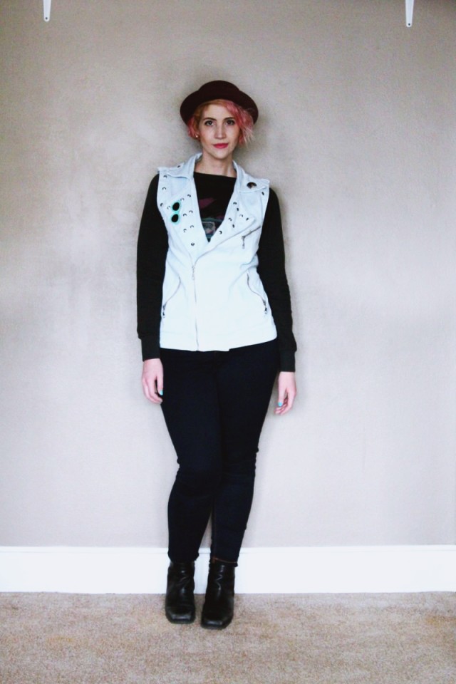 High waisted jeans, vintage sweatshirt, denim studded vest, black heeled boots, purple bowler hat