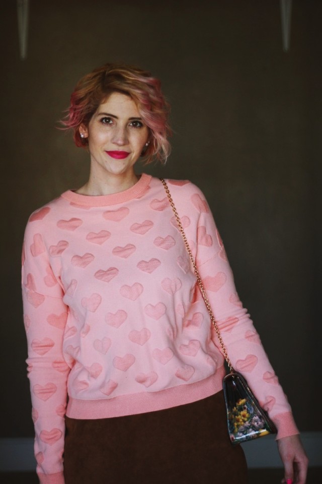 Valentine's Day to Night Outfit | theoutfitrepeater.com A heart printed pink sweatshirt is worn for a day to night outfit on Valentine's Day.