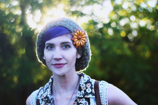 Changing the look of a slouchy knit hat with a vintage brooch.