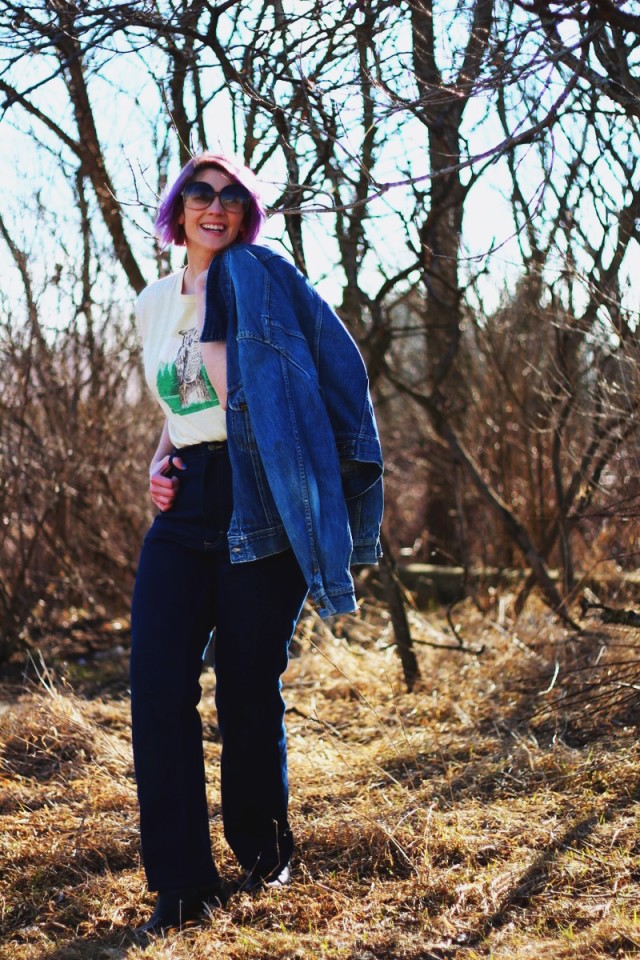 1970's inspired outfit: High waisted flared denim pants, jean jacket, vintage yellow owl graphic tee, oversized sunglasses, heeled boots, Seventeen magazine