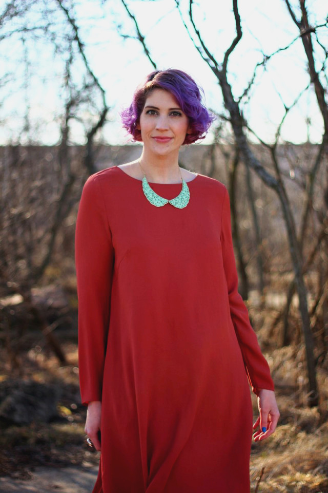 1960's fashion inspired by the movie Rosemary's Baby: burnt orange dress, blue peter pan collar necklace, curly purple hair, mod makeup