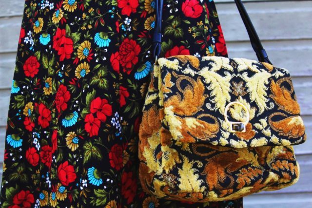 Spring style outfit: vintage thrifted red floral skirt, thrift yellow carpet bag pattern mixing