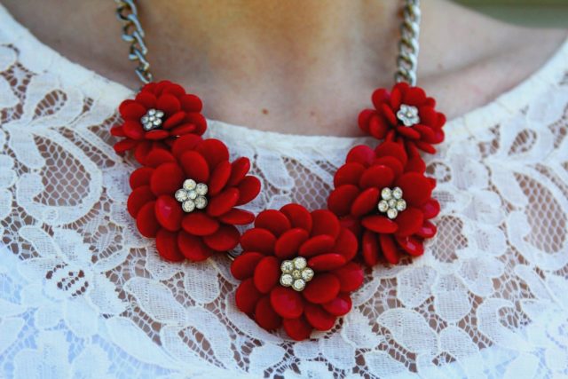 Spring style outfit: red flower necklace and white lace tee