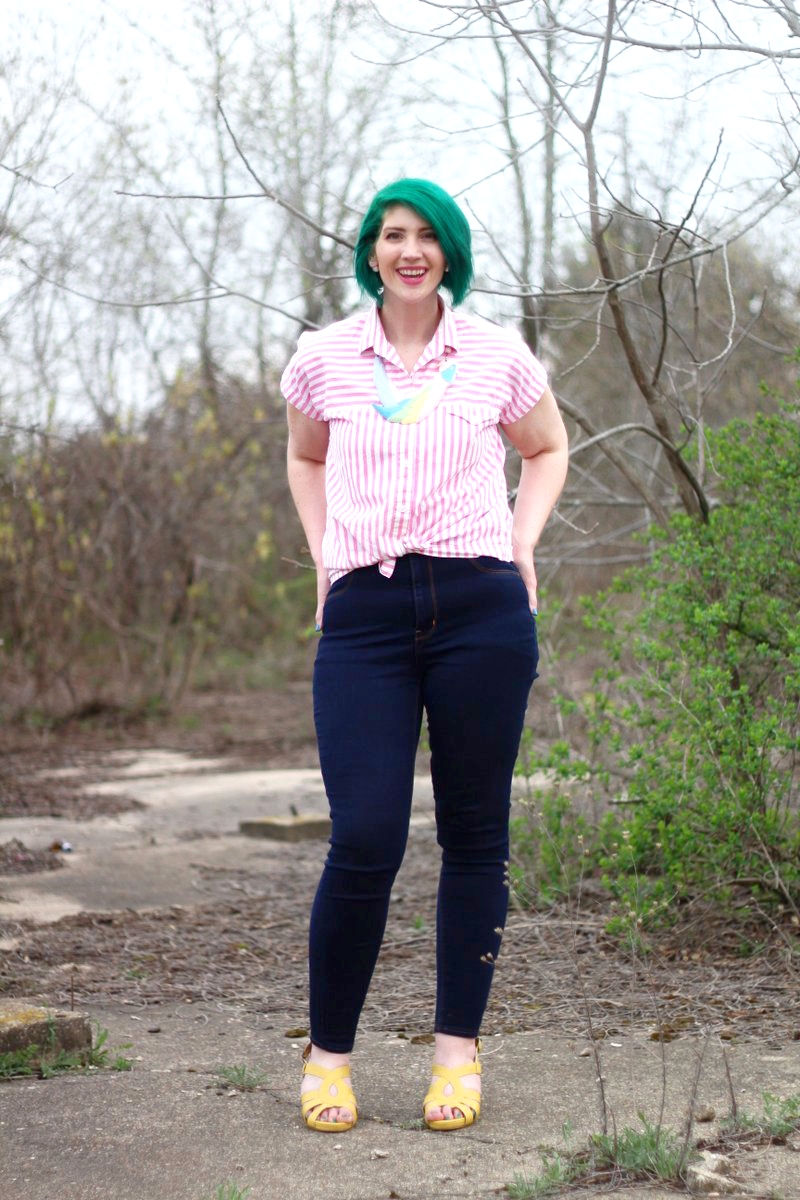 Outfit: pink striped button up, dark wash high waisted jeans, yellow high heels, a statement necklace in the shape of a parrot, green hair