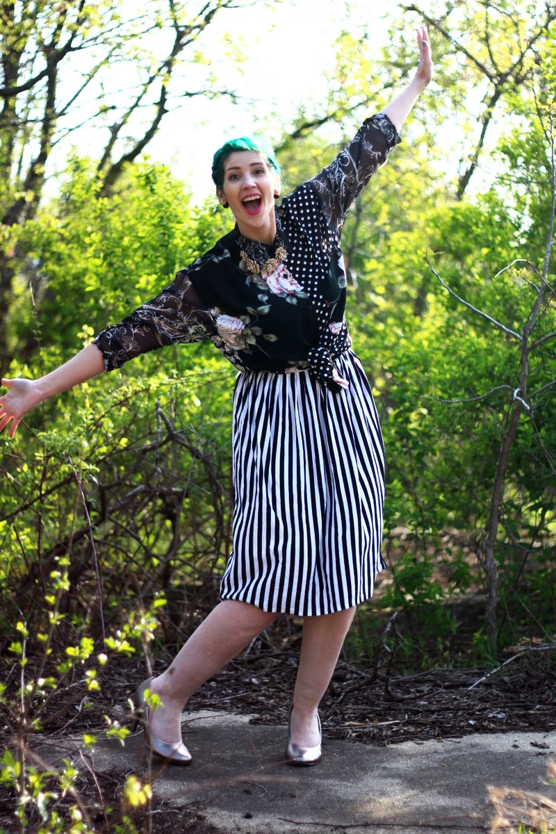 Mother's Day Outfit: Contempo Casual printed shirt, striped skirt, silver high heels, beige floral necklace, green hair