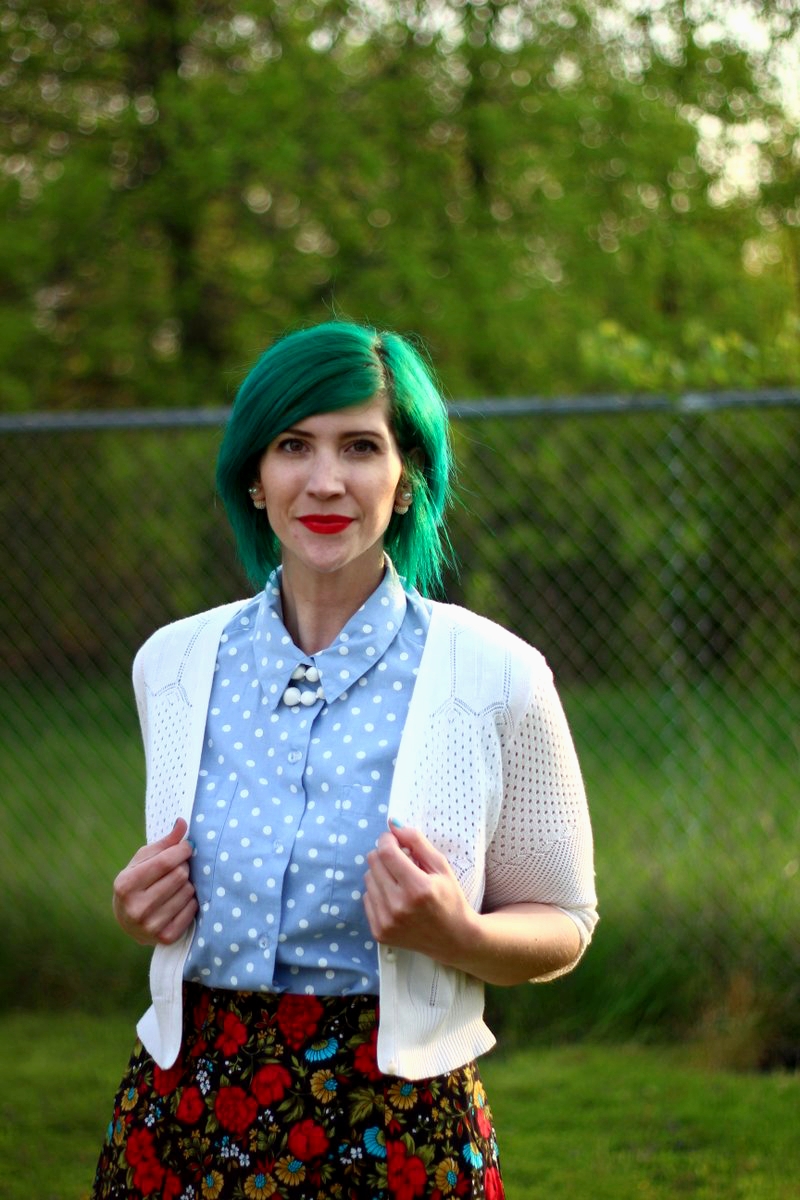 Outfit: polka dot chambray top, black floral skirt, green hair, white cardigan, vintage beaded necklace, red lips