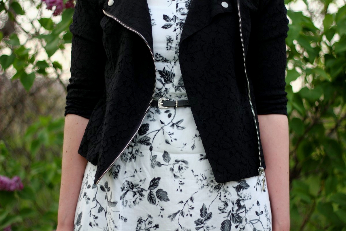 Outfit details: black and white floral dress, lace moto jacket, gray belt