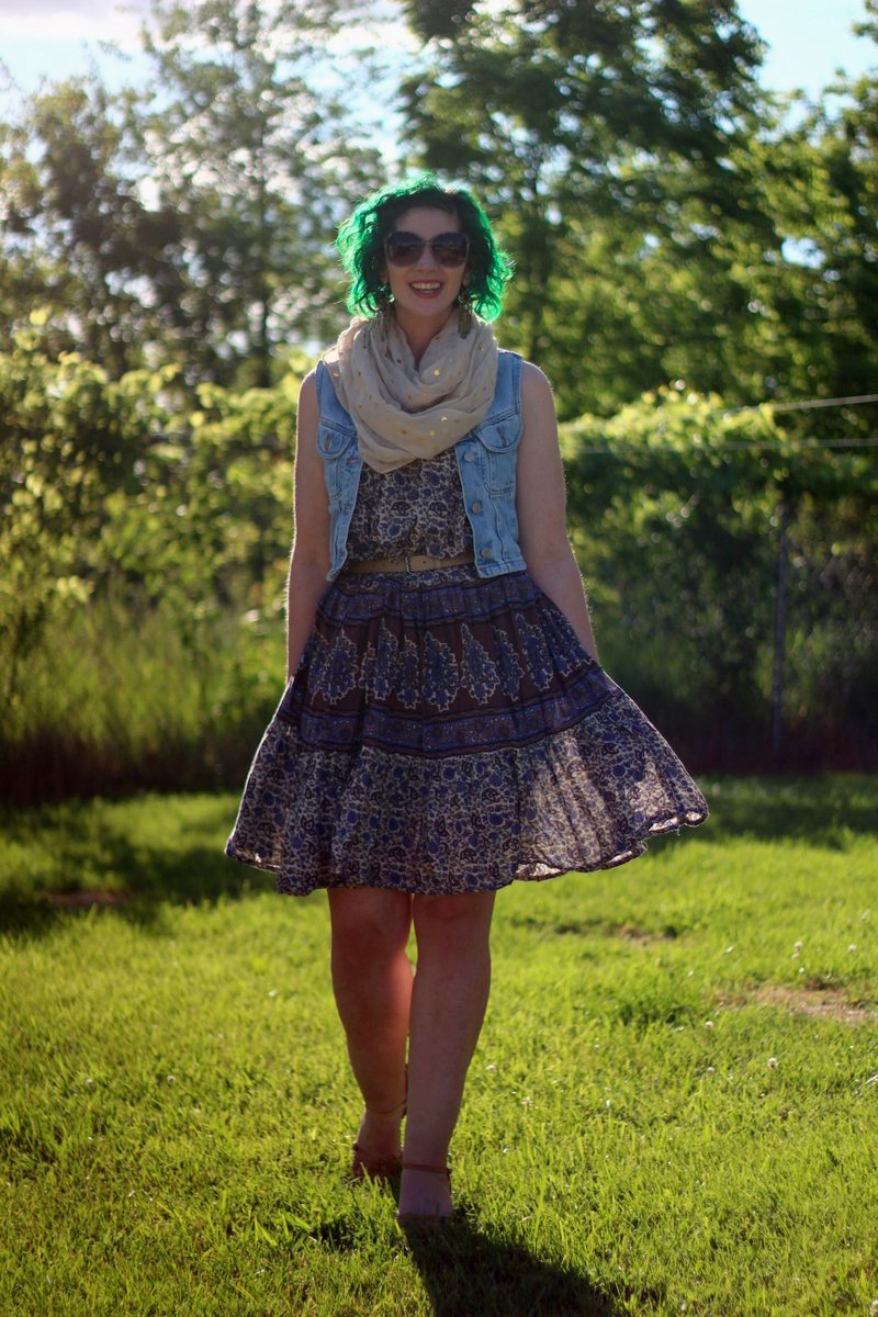 Outfit: patterned summer dress, light wash denim vest, gold polka dot scarf, beige belt, sunglasses, green hair, nude kitten heels