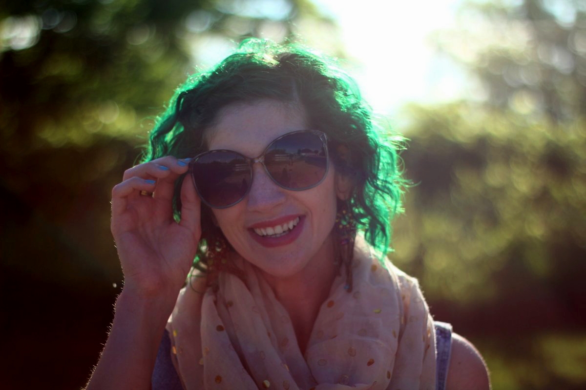 Outfit details: gold polka dot scarf, beige belt, sunglasses, green hair