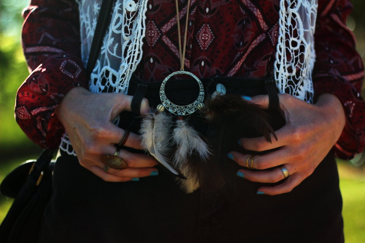 1 Top, 2 Music Festival Outfits | theoutfitrepeater.com boho style red peasant blouse, white lace vest, diy feather necklace and a handful of rings