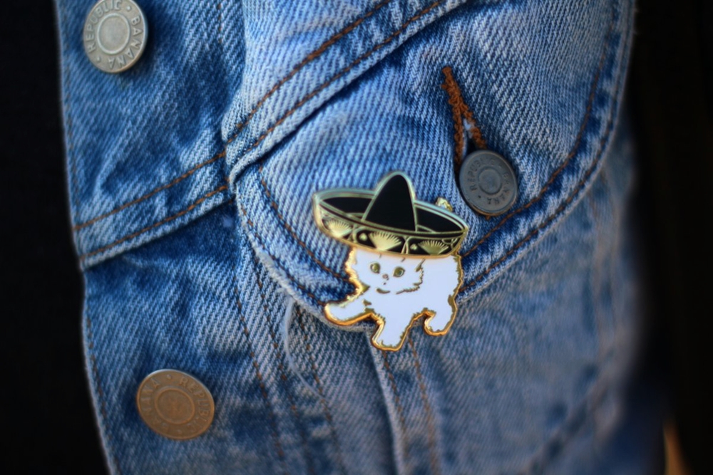 Outfit details: Darling Distraction kitten and sombrero enamel pin flair