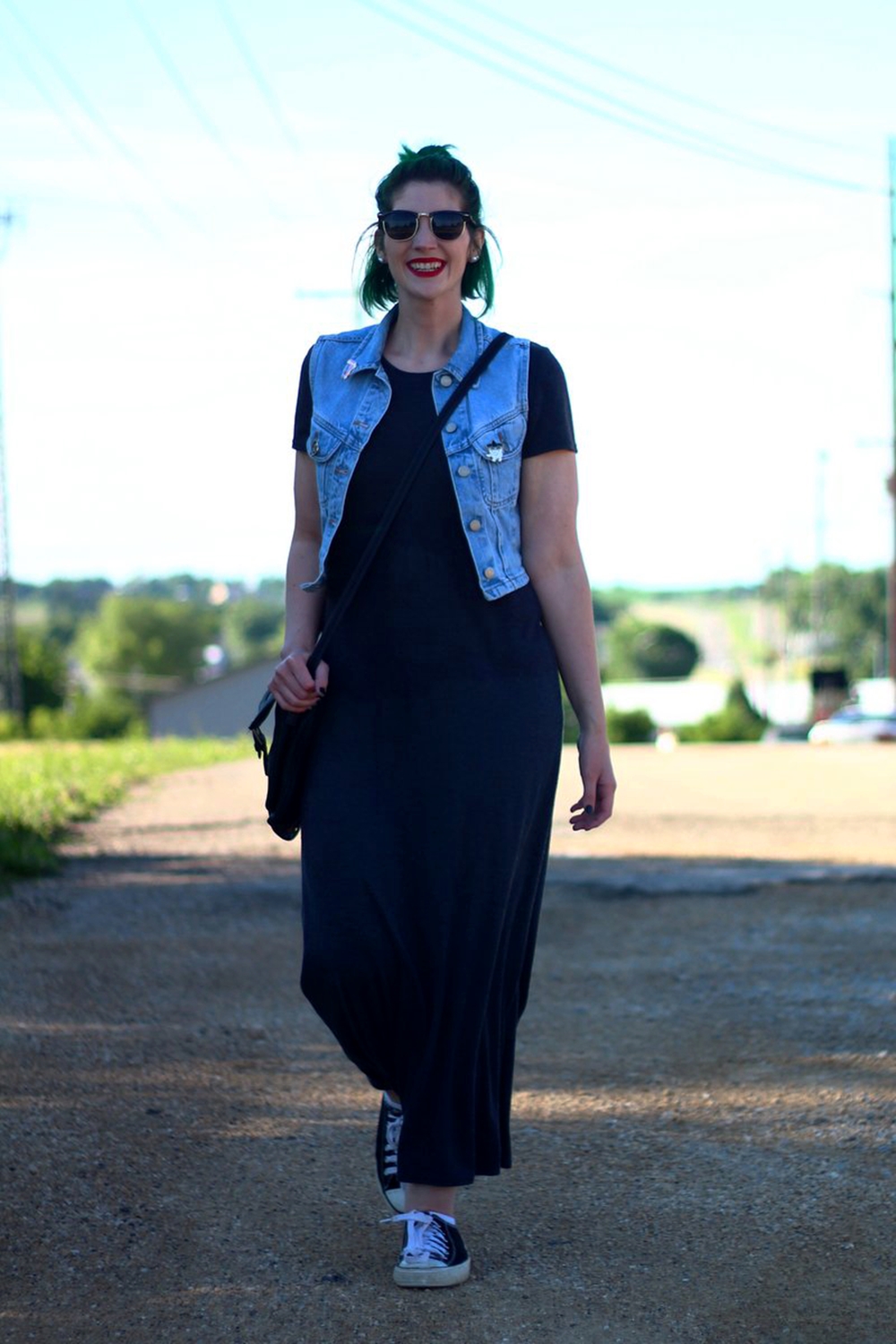 Outfit: gray ankle length maxi dress, light wash denim vest, thrifted crossbody bag, Darling Distraction enamel pins, ColourPop ultra matte lip color in Creeper, black and white sneakers
