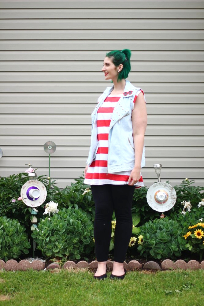 Outfit: red and white striped tunic, denim studded vest, vintage red sunglasses pin, green hair, red lipstick, black leggings, black flats