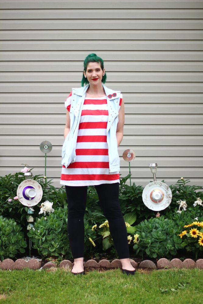 Outfit: red and white striped tunic, denim studded vest, vintage red sunglasses pin, green hair, red lipstick, black leggings, black flats