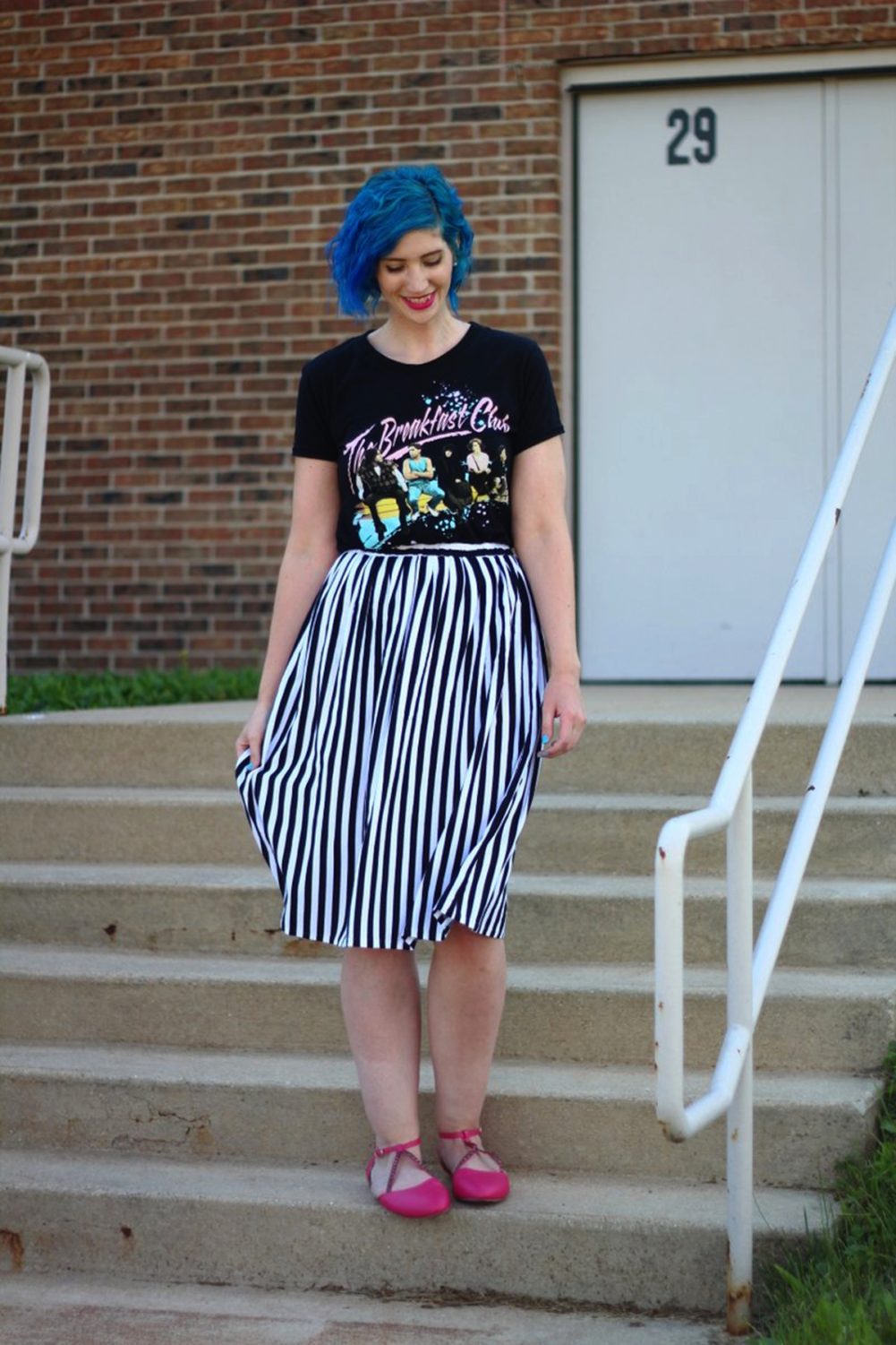 Outfit: Breakfast club graphic tee, black and white striped skirt, blue hair, pink lipstick, pink flats.