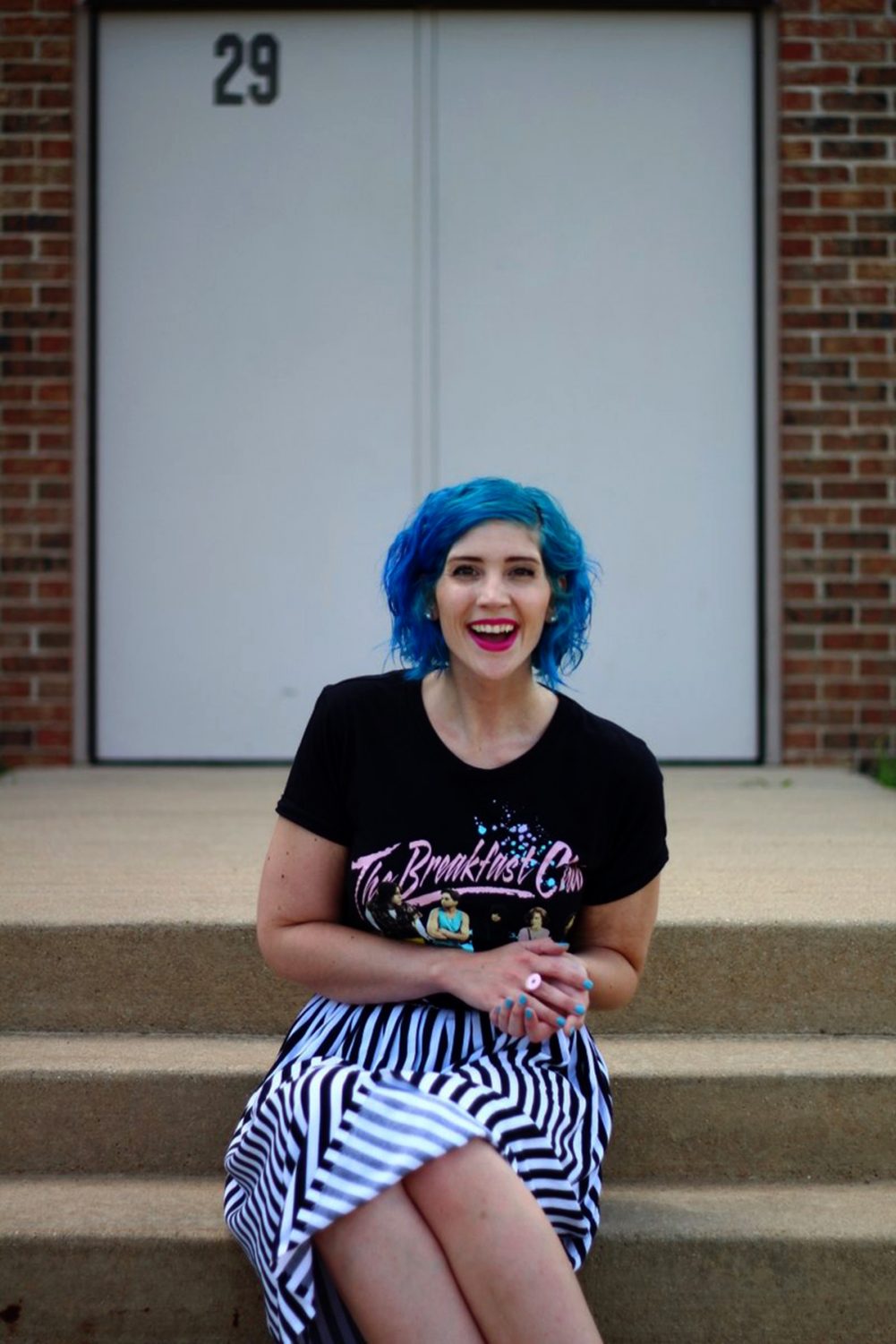 Outfit: Breakfast club graphic tee, black and white striped skirt, blue hair, pink lipstick, pink flats.