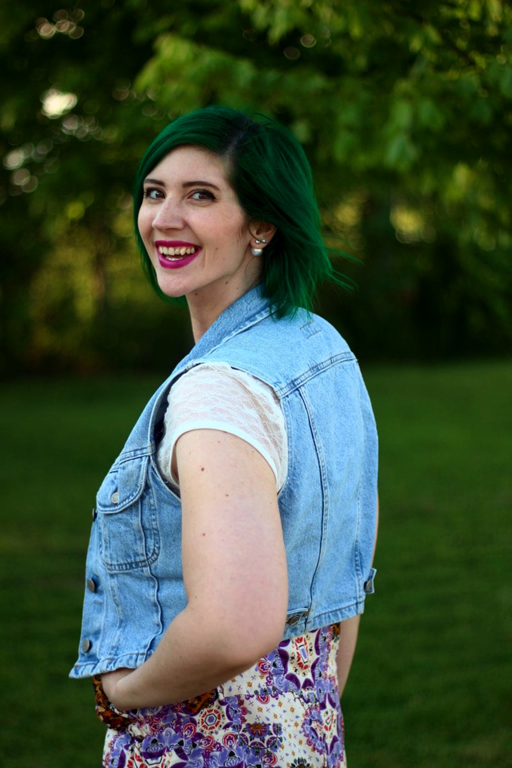 Clearly I've got this senior photo posing on lock! Outfit: purple boho romper overalls, white lace tee, light wash denim vest, green hair, purple lipstick