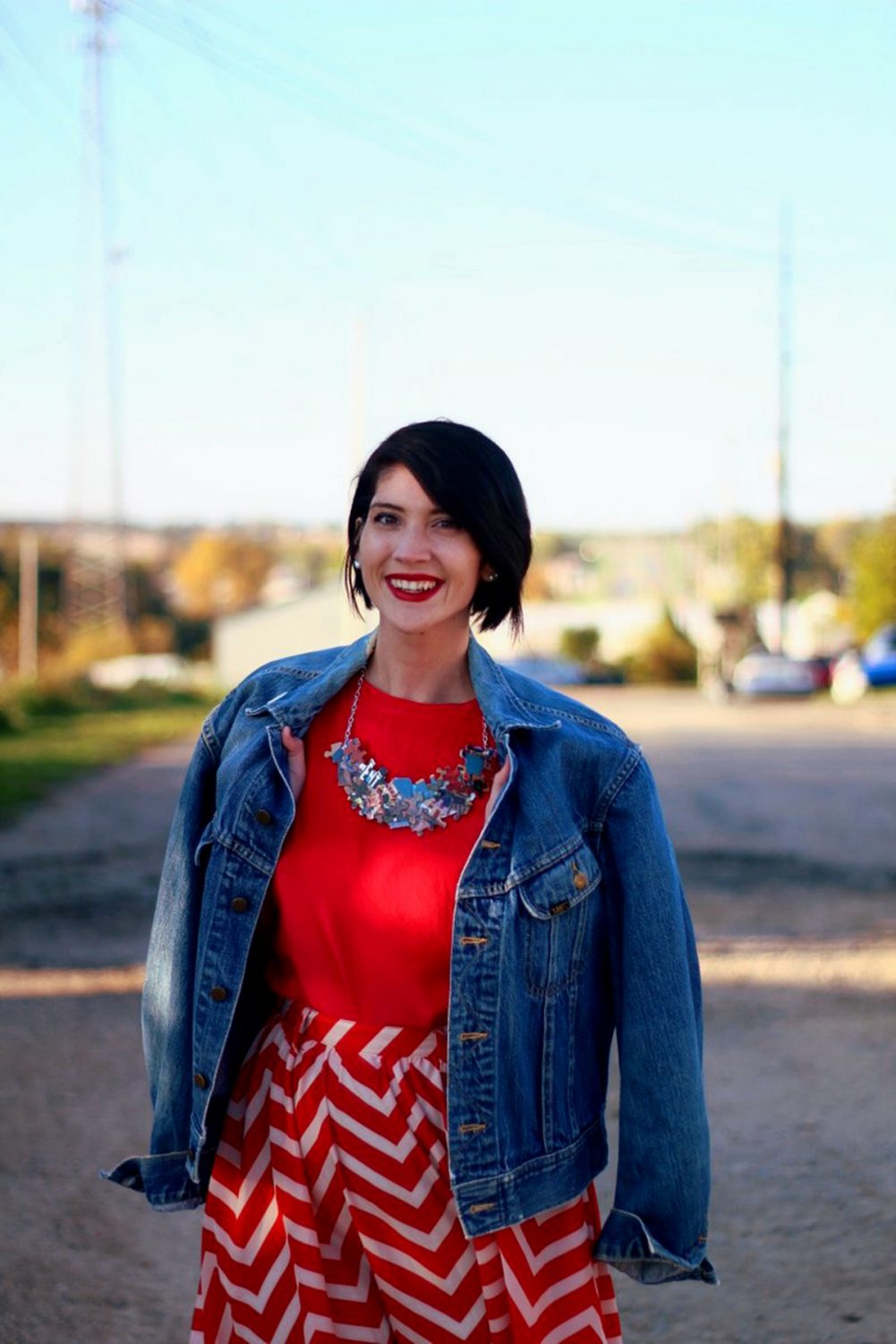 Outfit: Vintage red top, DIY puzzle piece necklace, red lipstick, thrifted orange chevron skirt, vintage denim jacket
