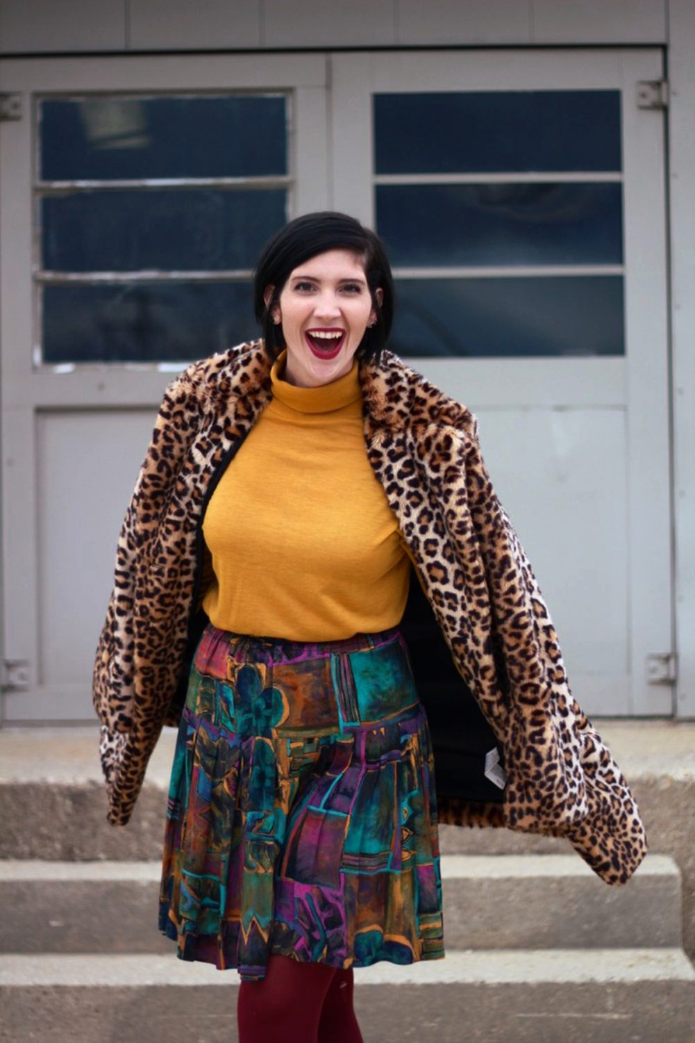 How A Leopard Print Coat Can Change Your Life | theoutfitrepeater.com Outfit: Leopard print coat, mustard yellow turtleneck, multi colored skirt