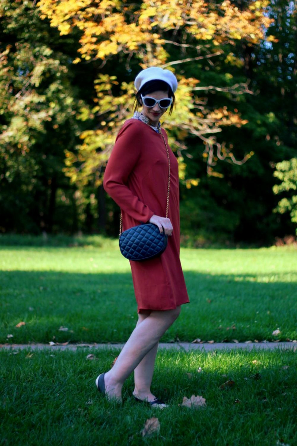 Outfit: Orange retro style dress, flower collar, jewel flower brooch, cream colored beret, navy purse, brown flats