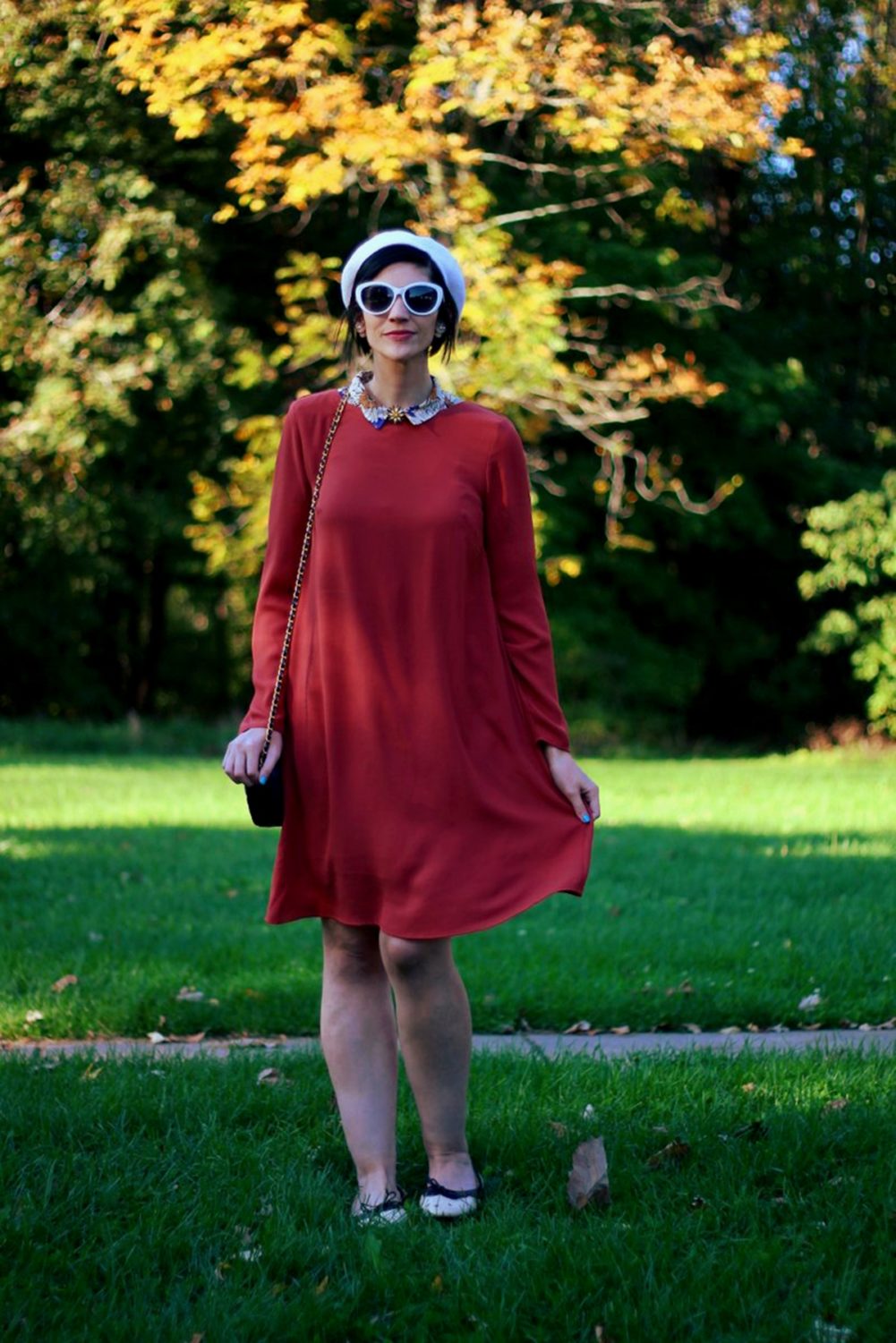 Outfit: Orange retro style dress, flower collar, jewel flower brooch, cream colored beret, navy purse, brown flats