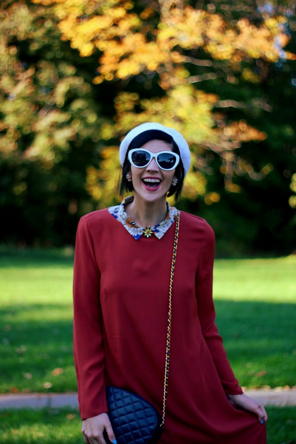 Outfit: Orange retro style dress, flower collar, jewel flower brooch, cream colored beret, navy purse
