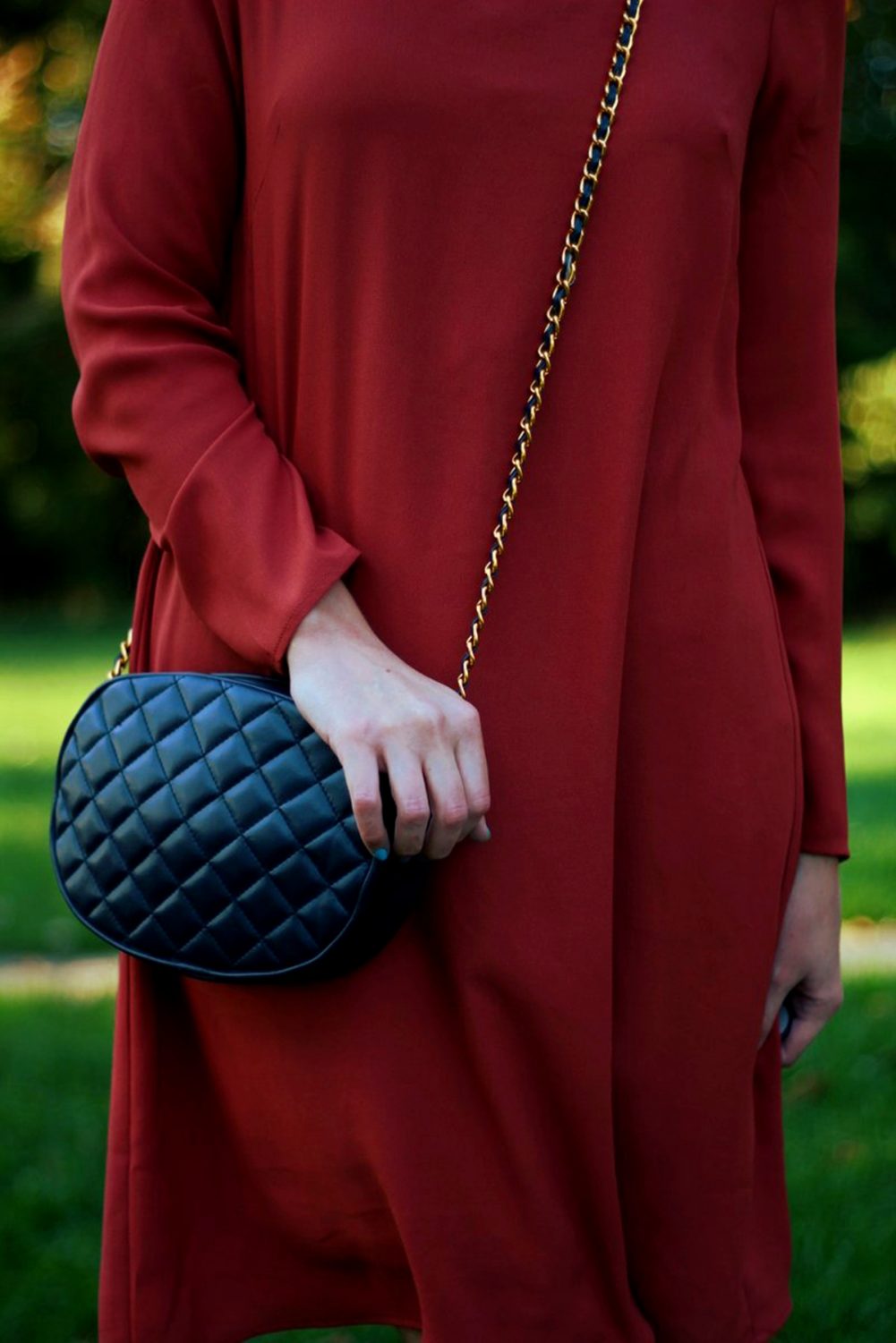 Outfit details: Orange retro style dress and navy purse
