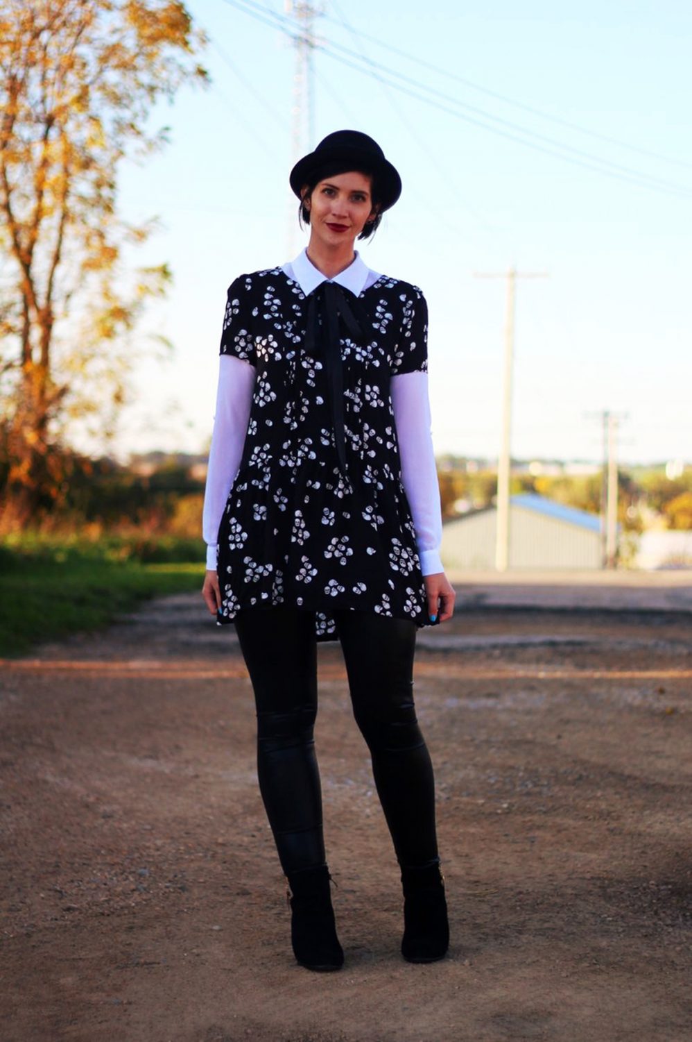 Outfit: Skull and crossbone dress, white button down, DIY ribbon, pork pie hat, dark lipstick, liquid leggings, black heeled booties 