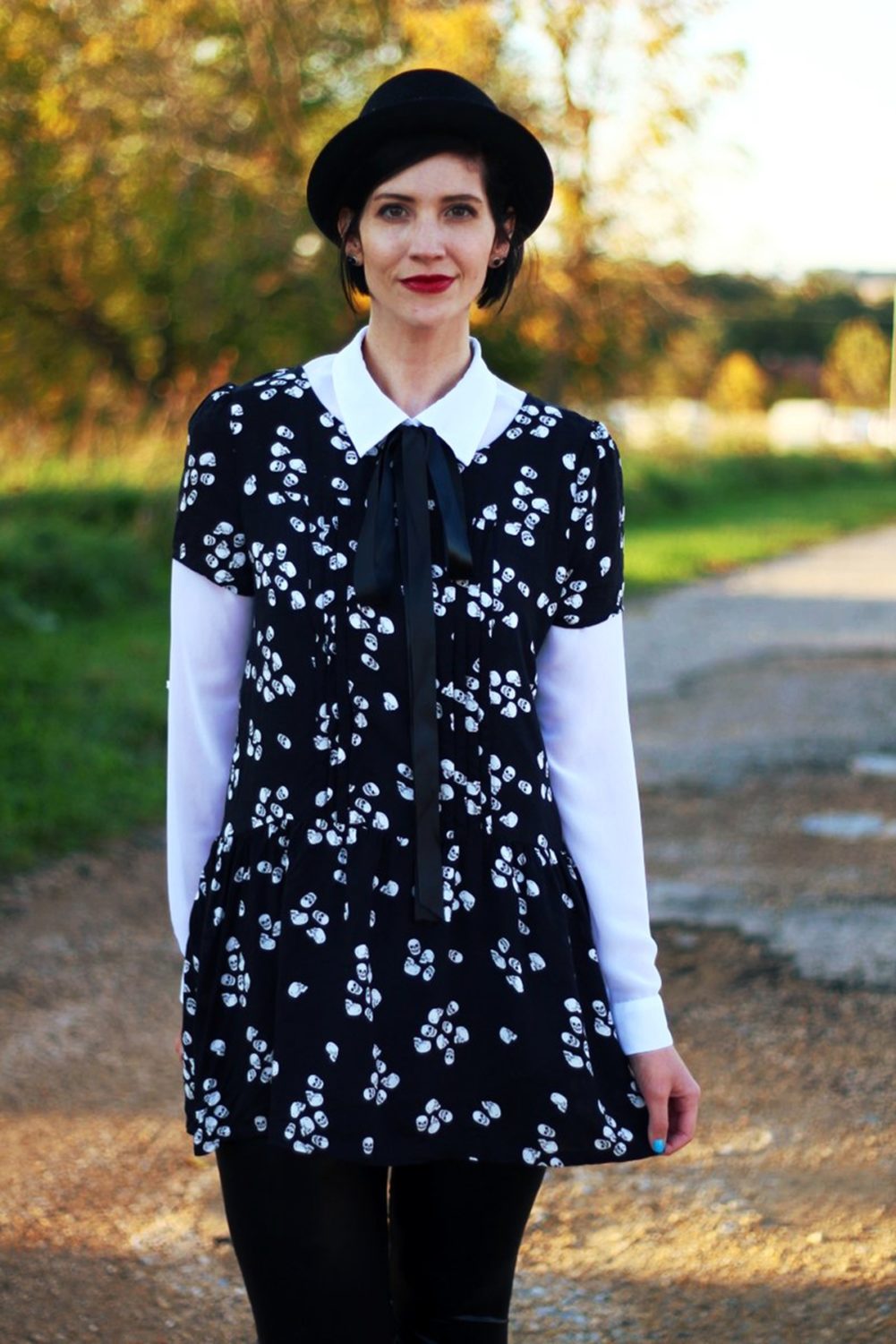Outfit: Skull and crossbone dress, white button down, DIY ribbon, pork pie hat, dark lipstick