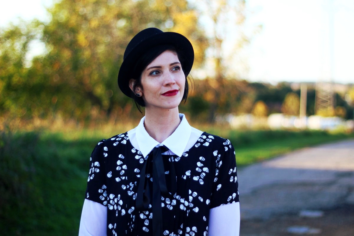 Outfit: Skull and crossbone dress, white button down, DIY ribbon, pork pie hat, dark lipstick