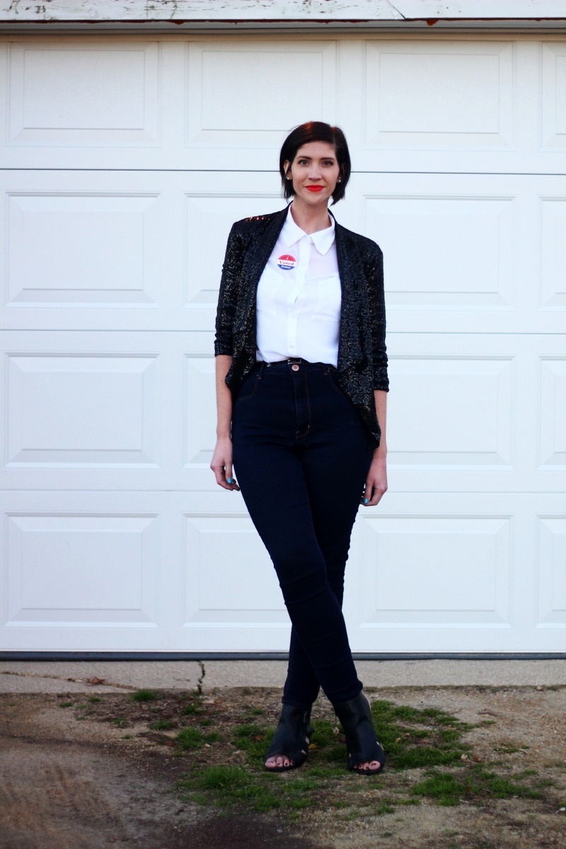Election day outfit: white button up, red lipstick, I Voted sticker, black sequined blazer, high waisted jeans, black cutout heels