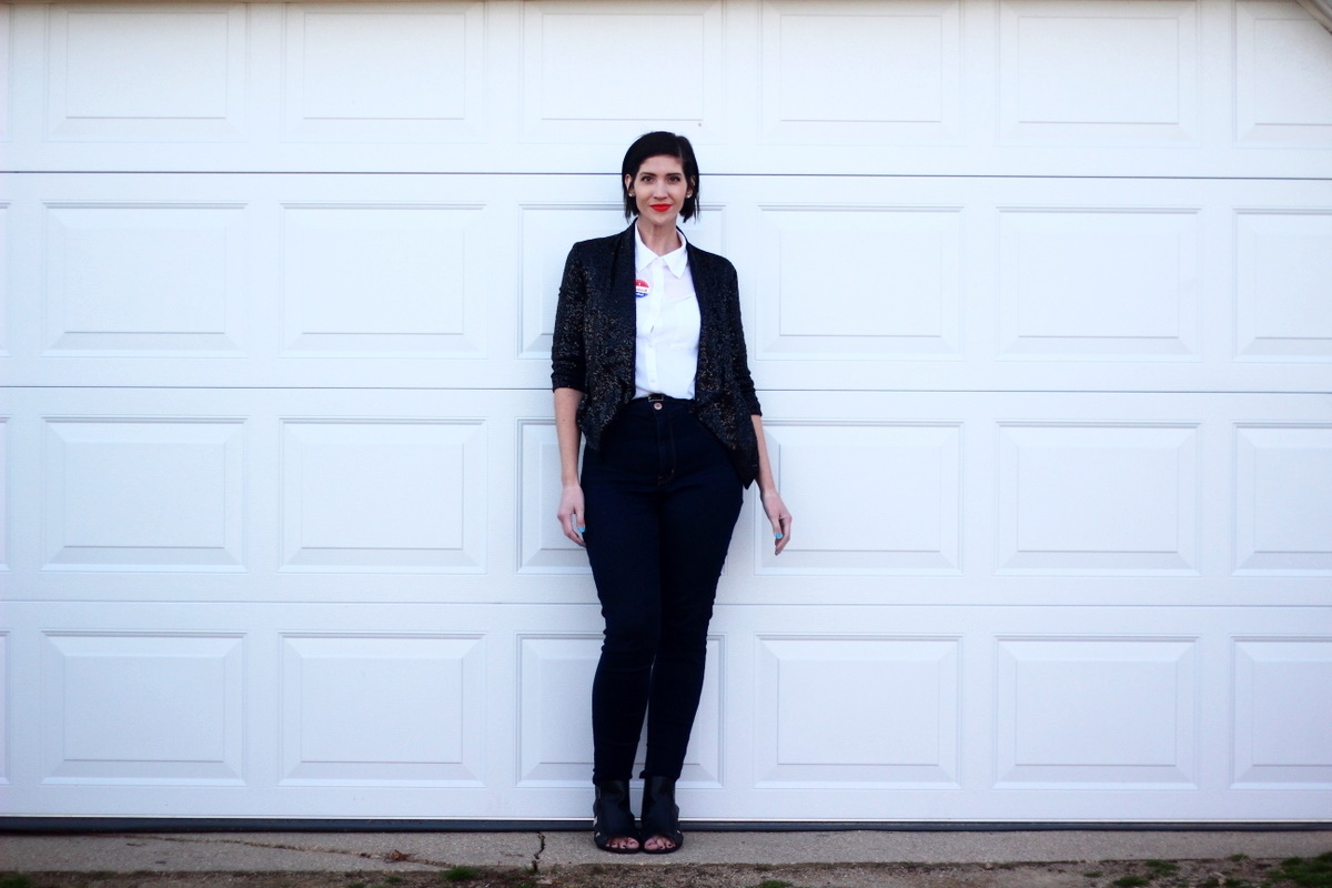 Election day outfit: white button up, red lipstick, I Voted sticker, black sequined blazer, high waisted jeans, black cutout heels