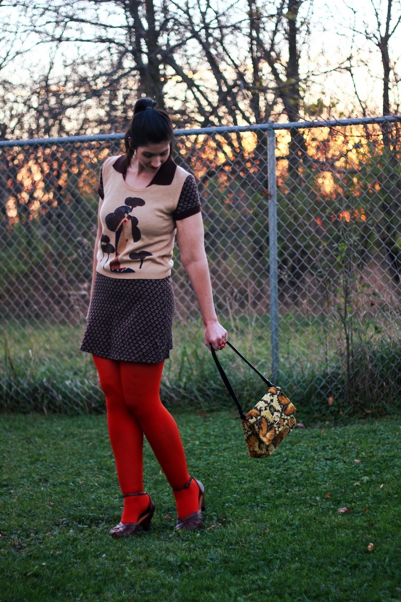 Outfit: Brown mini dress, vintage vest, orange lipstick, orange tights, ugly yellow purse, brown chunky heels